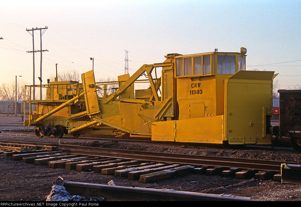 CNW 11983, Jordan Spreader, at Proviso Yard